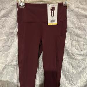 Fabletics Oasis PureLuxe High-Waisted Pocket Leggings in Burgundy